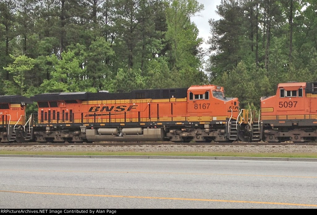 BNSF 8167 and 5097 in a quartet of units